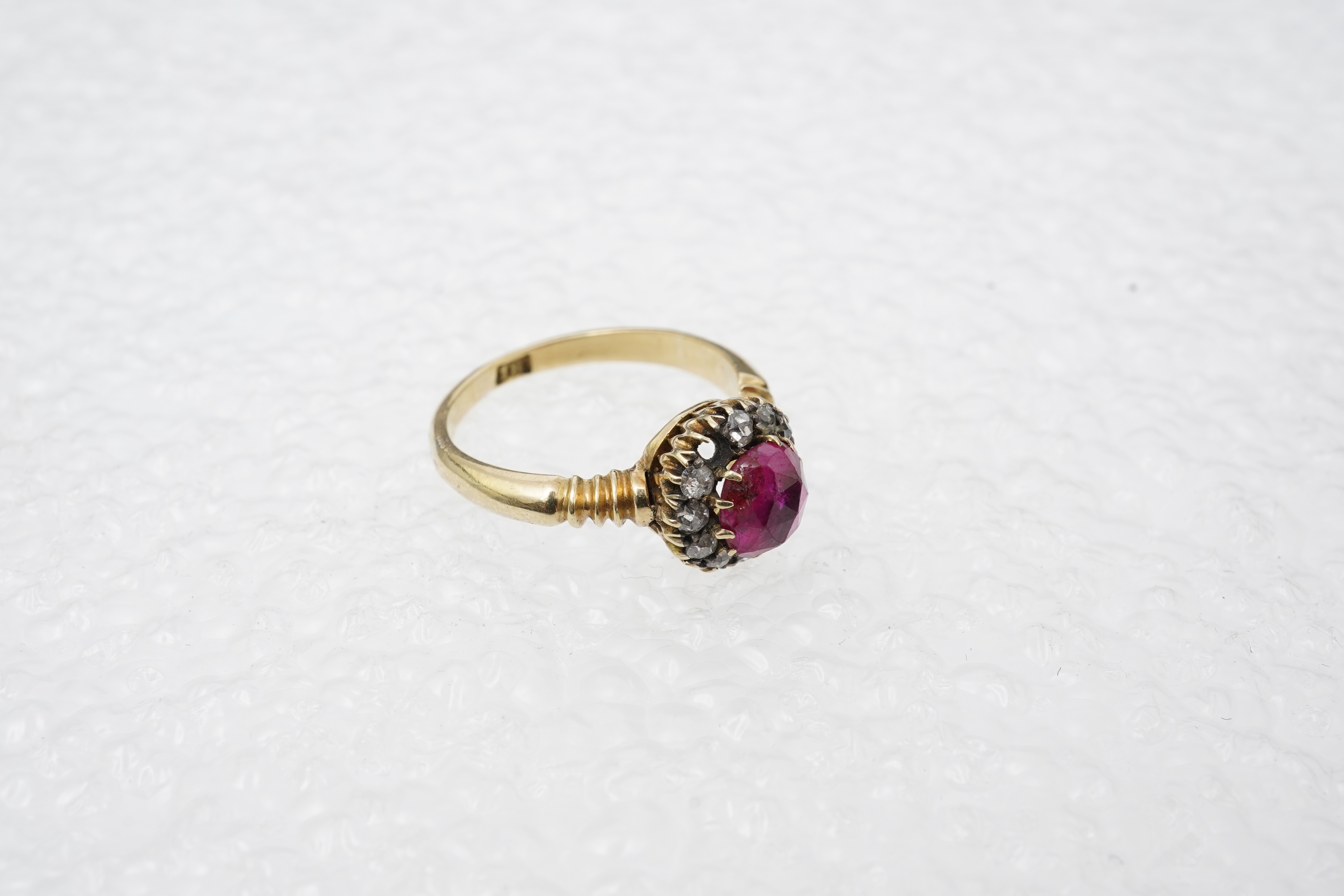 A ruby and diamond cluster ring, circa 1900